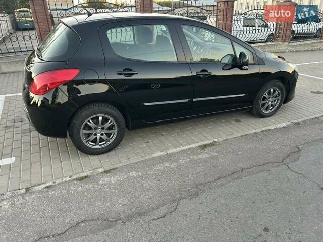 Пежо 308 2013 в Ровно на Automoto.ua Черный Пежо 308, объемом двигателя 1.6 л и пробегом 145 тыс. км за 7400 $, фото 6 на Automoto.ua