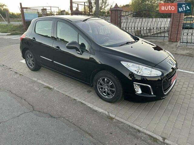 Черный Пежо 308, объемом двигателя 1.6 л и пробегом 145 тыс. км за 7400 $, фото 4 на Automoto.ua