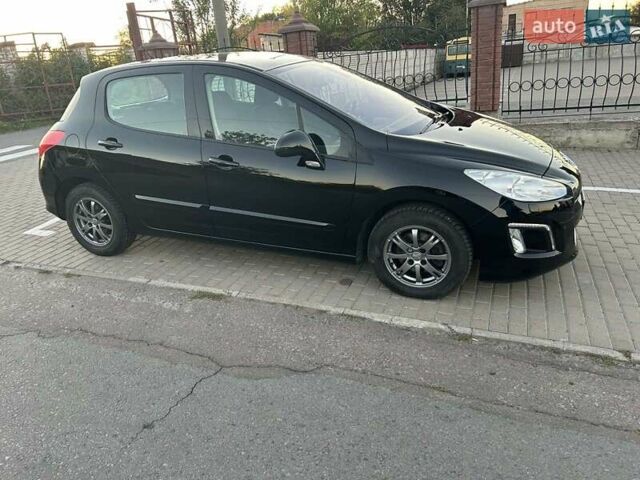 Черный Пежо 308, объемом двигателя 1.6 л и пробегом 145 тыс. км за 7400 $, фото 5 на Automoto.ua