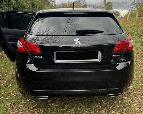 Черный Пежо 308, объемом двигателя 2 л и пробегом 233 тыс. км за 11500 $, фото 1 на Automoto.ua