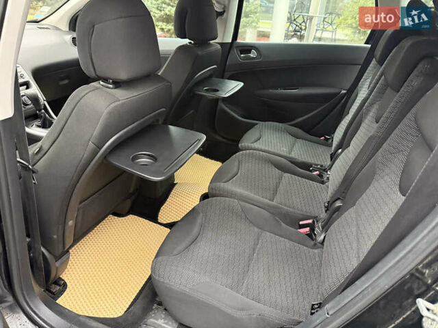 Черный Пежо 308, объемом двигателя 1.56 л и пробегом 240 тыс. км за 3500 $, фото 11 на Automoto.ua