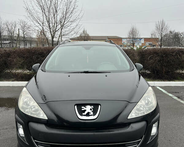 Черный Пежо 308, объемом двигателя 1.6 л и пробегом 260 тыс. км за 4700 $, фото 7 на Automoto.ua