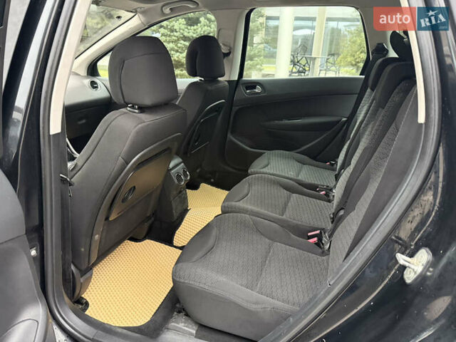 Черный Пежо 308, объемом двигателя 1.56 л и пробегом 240 тыс. км за 3500 $, фото 10 на Automoto.ua