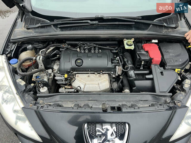 Черный Пежо 308, объемом двигателя 1.6 л и пробегом 260 тыс. км за 4700 $, фото 16 на Automoto.ua