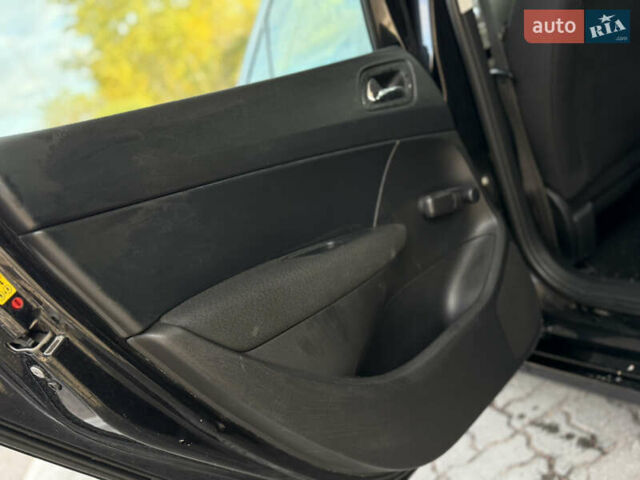 Черный Пежо 308, объемом двигателя 1.6 л и пробегом 248 тыс. км за 5350 $, фото 41 на Automoto.ua