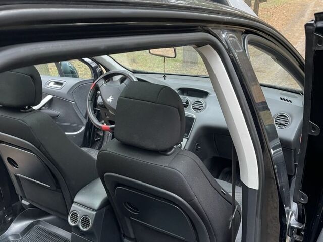 Черный Пежо 308, объемом двигателя 1.6 л и пробегом 233 тыс. км за 4500 $, фото 18 на Automoto.ua