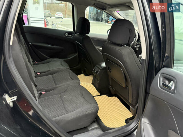 Черный Пежо 308, объемом двигателя 1.56 л и пробегом 240 тыс. км за 3500 $, фото 12 на Automoto.ua