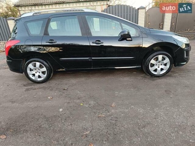 Чорний Пежо 308, об'ємом двигуна 1.6 л та пробігом 190 тис. км за 4800 $, фото 6 на Automoto.ua