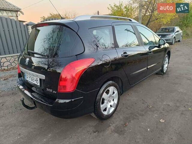 Чорний Пежо 308, об'ємом двигуна 1.6 л та пробігом 190 тис. км за 4800 $, фото 4 на Automoto.ua