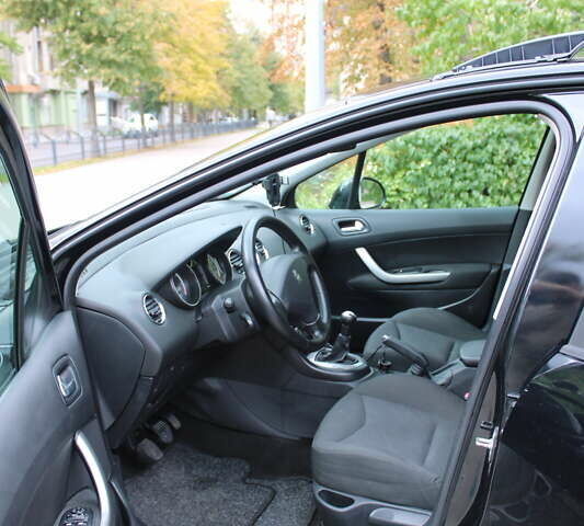 Чорний Пежо 308, об'ємом двигуна 1.4 л та пробігом 265 тис. км за 4299 $, фото 7 на Automoto.ua
