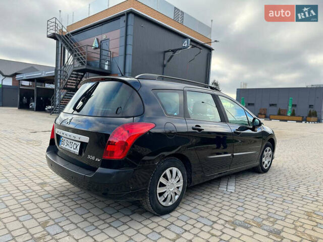 Черный Пежо 308, объемом двигателя 1.4 л и пробегом 251 тыс. км за 4300 $, фото 2 на Automoto.ua