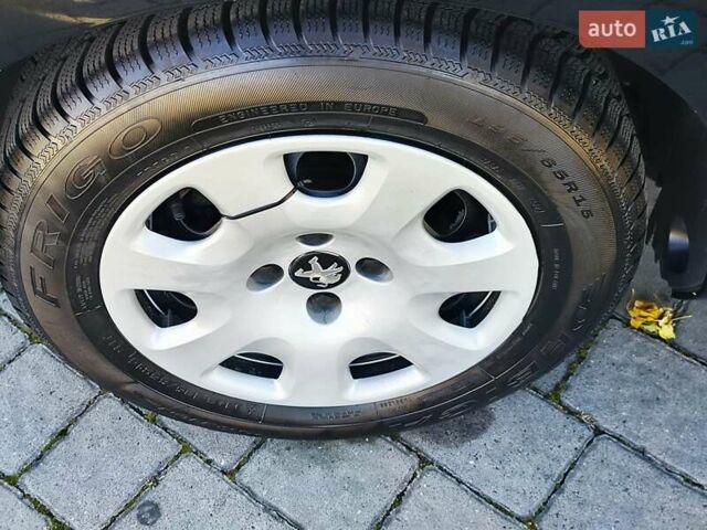 Пежо 308 2009 в Львове на Automoto.ua Черный Пежо 308, объемом двигателя 1.6 л и пробегом 240 тыс. км за 5250 $, фото 11 на Automoto.ua