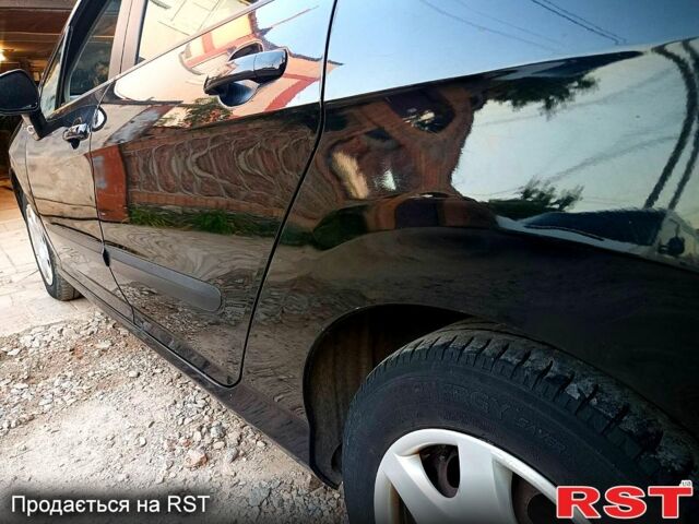 Черный Пежо 308, объемом двигателя 1.6 л и пробегом 250 тыс. км за 4950 $, фото 5 на Automoto.ua