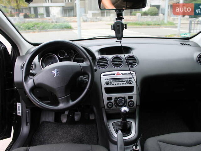 Чорний Пежо 308, об'ємом двигуна 1.4 л та пробігом 265 тис. км за 4299 $, фото 8 на Automoto.ua