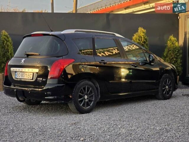 Чорний Пежо 308, об'ємом двигуна 1.6 л та пробігом 196 тис. км за 3999 $, фото 7 на Automoto.ua