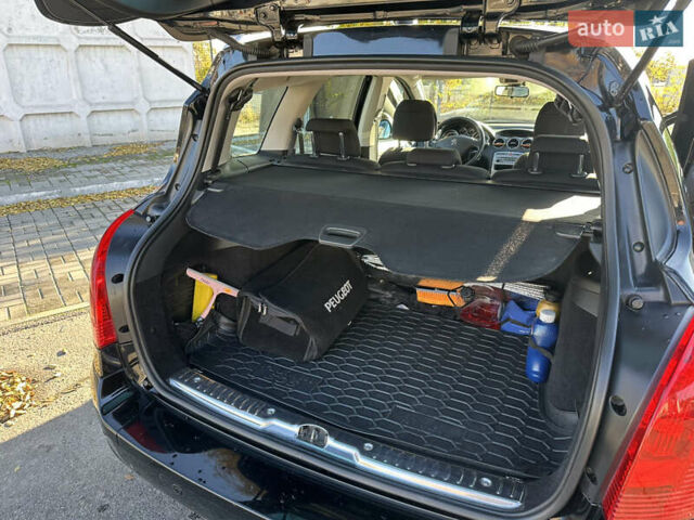 Чорний Пежо 308, об'ємом двигуна 1.6 л та пробігом 236 тис. км за 5800 $, фото 4 на Automoto.ua