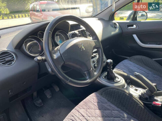 Черный Пежо 308, объемом двигателя 1.56 л и пробегом 286 тыс. км за 5950 $, фото 9 на Automoto.ua