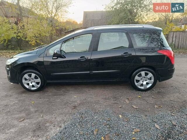 Чорний Пежо 308, об'ємом двигуна 1.6 л та пробігом 190 тис. км за 4800 $, фото 5 на Automoto.ua