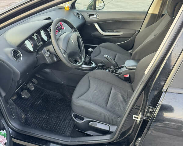 Черный Пежо 308, объемом двигателя 1.6 л и пробегом 248 тыс. км за 4999 $, фото 17 на Automoto.ua