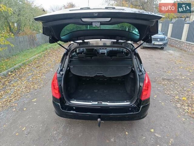 Чорний Пежо 308, об'ємом двигуна 1.6 л та пробігом 190 тис. км за 4800 $, фото 10 на Automoto.ua