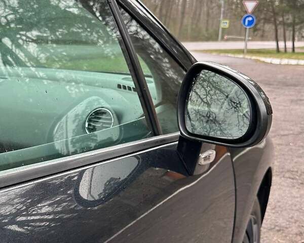 Черный Пежо 308, объемом двигателя 1.56 л и пробегом 212 тыс. км за 5300 $, фото 12 на Automoto.ua