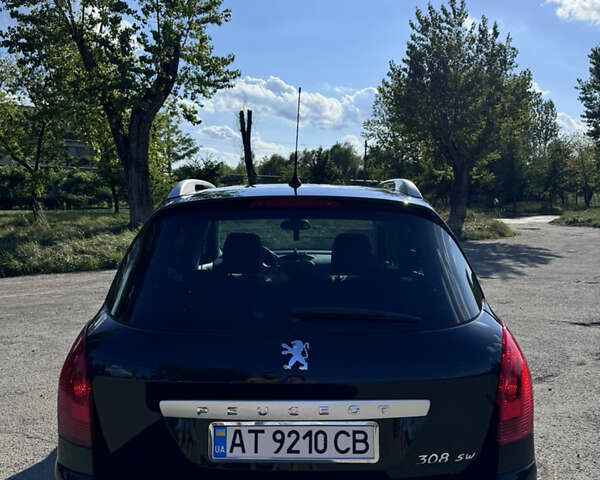 Чорний Пежо 308, об'ємом двигуна 1.6 л та пробігом 203 тис. км за 6100 $, фото 4 на Automoto.ua