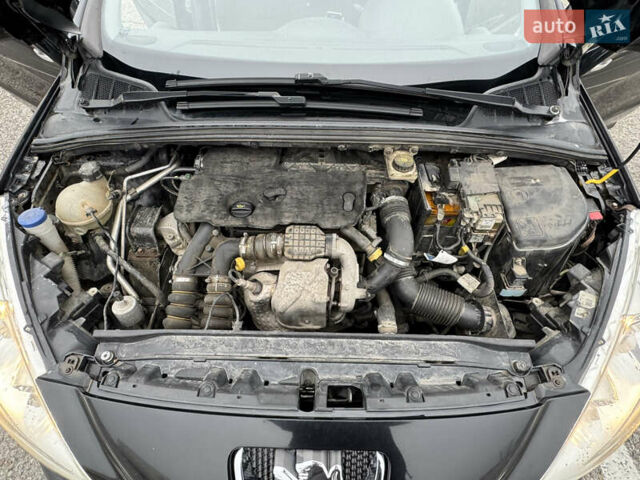 Черный Пежо 308, объемом двигателя 1.56 л и пробегом 225 тыс. км за 5500 $, фото 8 на Automoto.ua