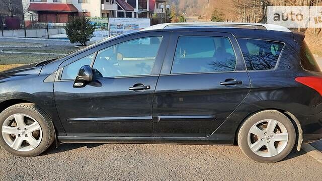 Чорний Пежо 308, об'ємом двигуна 1.6 л та пробігом 232 тис. км за 6100 $, фото 3 на Automoto.ua