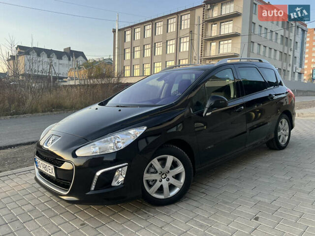 Чорний Пежо 308, об'ємом двигуна 1.6 л та пробігом 270 тис. км за 6199 $, фото 6 на Automoto.ua