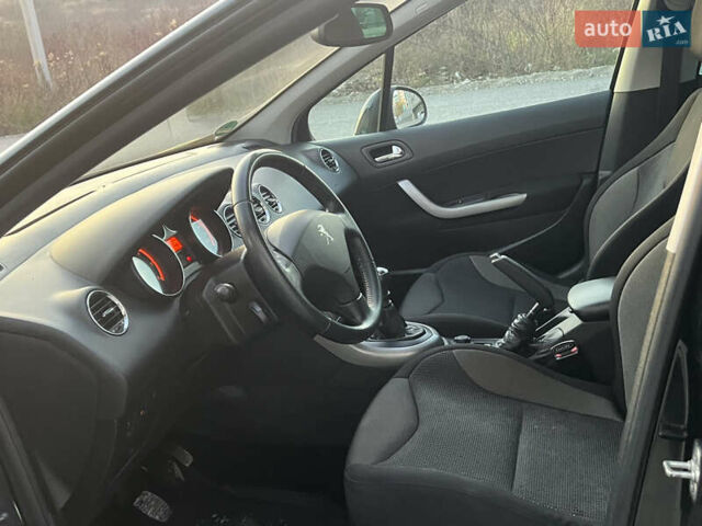 Чорний Пежо 308, об'ємом двигуна 1.6 л та пробігом 270 тис. км за 6199 $, фото 30 на Automoto.ua