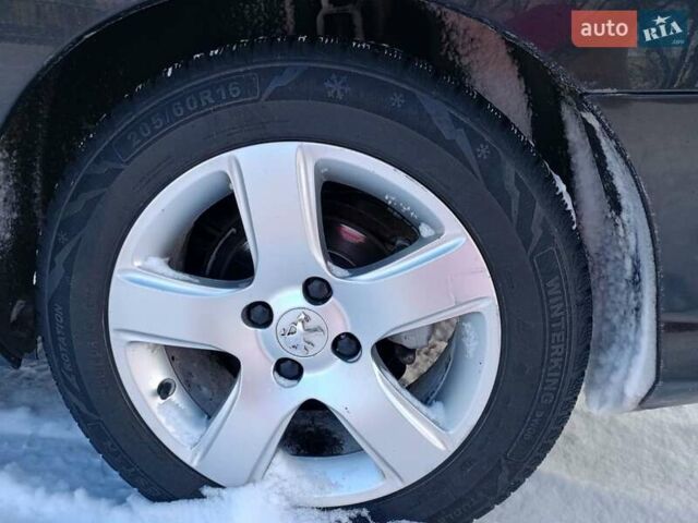 Чорний Пежо 308, об'ємом двигуна 1.56 л та пробігом 302 тис. км за 6600 $, фото 11 на Automoto.ua
