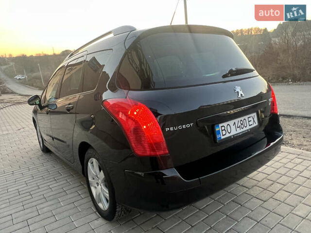 Чорний Пежо 308, об'ємом двигуна 1.6 л та пробігом 270 тис. км за 6199 $, фото 12 на Automoto.ua