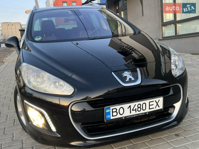 Чорний Пежо 308, об'ємом двигуна 1.6 л та пробігом 270 тис. км за 6199 $, фото 24 на Automoto.ua