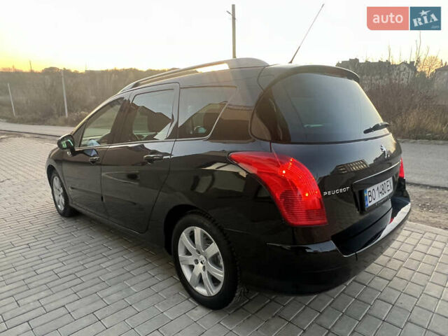 Чорний Пежо 308, об'ємом двигуна 1.6 л та пробігом 270 тис. км за 6199 $, фото 10 на Automoto.ua
