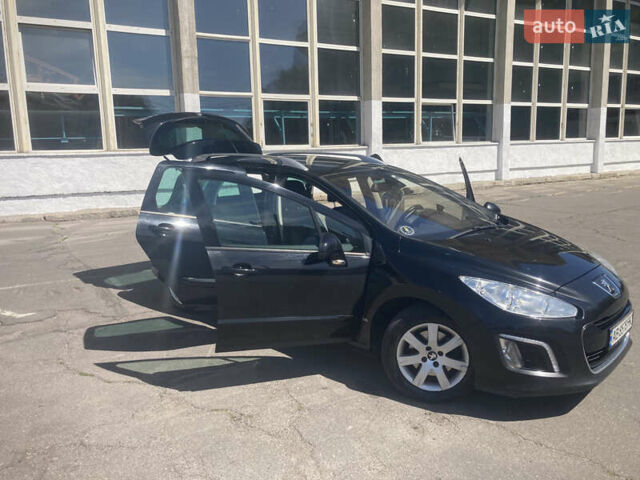 Черный Пежо 308, объемом двигателя 2 л и пробегом 250 тыс. км за 7199 $, фото 4 на Automoto.ua