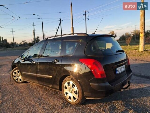 Черный Пежо 308, объемом двигателя 1.6 л и пробегом 220 тыс. км за 5700 $, фото 1 на Automoto.ua