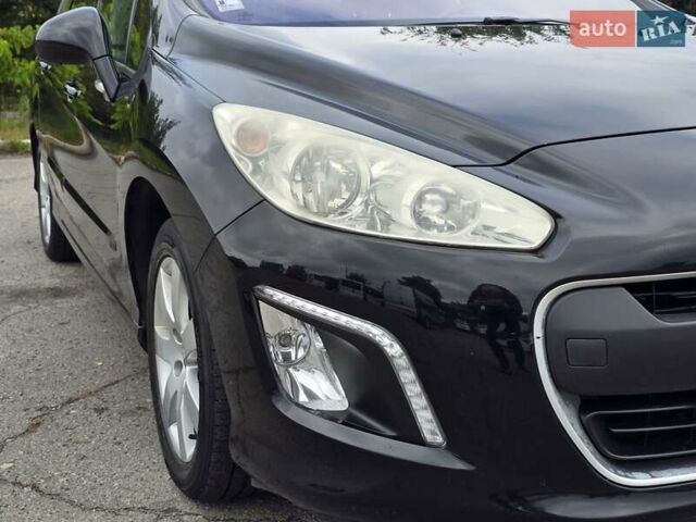 Черный Пежо 308, объемом двигателя 1.6 л и пробегом 161 тыс. км за 6499 $, фото 11 на Automoto.ua