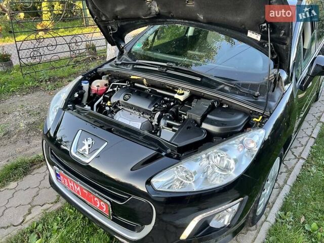 Чорний Пежо 308, об'ємом двигуна 1.6 л та пробігом 172 тис. км за 6200 $, фото 74 на Automoto.ua