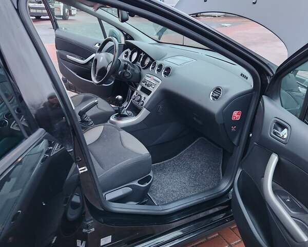 Черный Пежо 308, объемом двигателя 1.6 л и пробегом 173 тыс. км за 5600 $, фото 16 на Automoto.ua