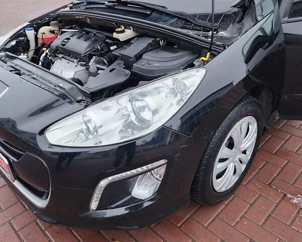 Черный Пежо 308, объемом двигателя 1.6 л и пробегом 173 тыс. км за 5600 $, фото 11 на Automoto.ua