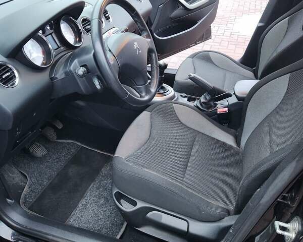 Черный Пежо 308, объемом двигателя 1.6 л и пробегом 173 тыс. км за 5600 $, фото 15 на Automoto.ua
