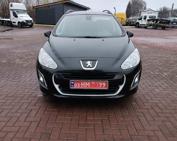 Черный Пежо 308, объемом двигателя 1.6 л и пробегом 173 тыс. км за 5600 $, фото 1 на Automoto.ua