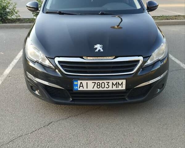 Черный Пежо 308, объемом двигателя 1.56 л и пробегом 205 тыс. км за 8800 $, фото 1 на Automoto.ua