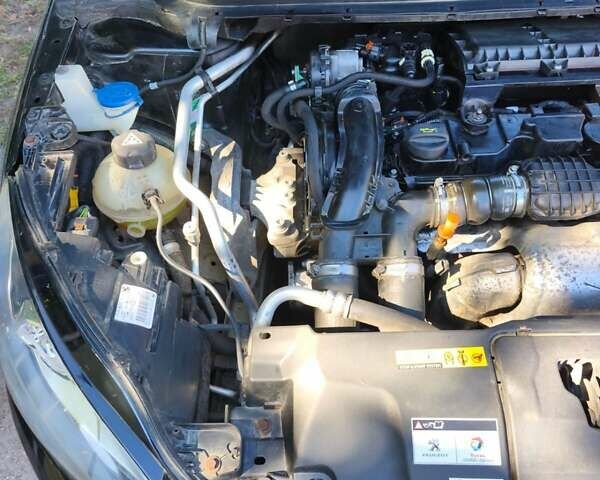 Черный Пежо 308, объемом двигателя 1.56 л и пробегом 221 тыс. км за 9500 $, фото 31 на Automoto.ua