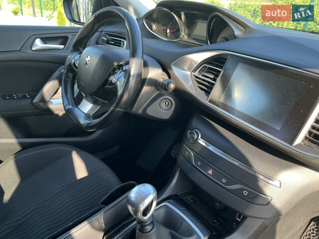Черный Пежо 308, объемом двигателя 1.56 л и пробегом 284 тыс. км за 9300 $, фото 18 на Automoto.ua