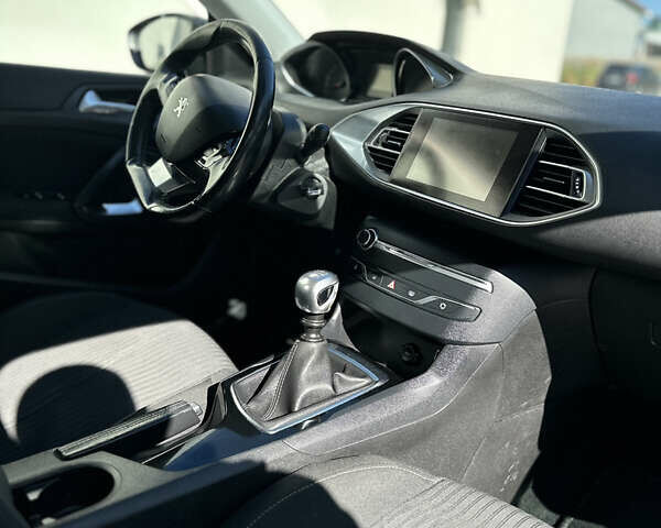 Черный Пежо 308, объемом двигателя 1.6 л и пробегом 212 тыс. км за 9500 $, фото 12 на Automoto.ua