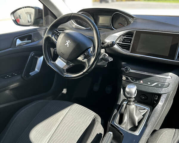 Черный Пежо 308, объемом двигателя 1.6 л и пробегом 212 тыс. км за 9500 $, фото 13 на Automoto.ua