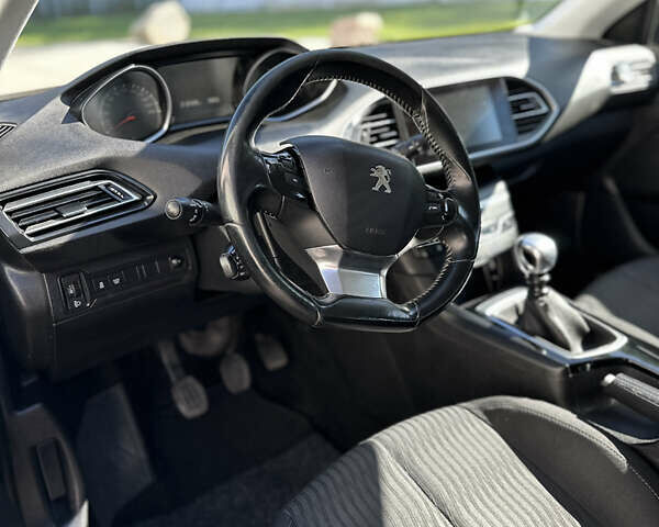 Черный Пежо 308, объемом двигателя 1.6 л и пробегом 212 тыс. км за 9500 $, фото 11 на Automoto.ua