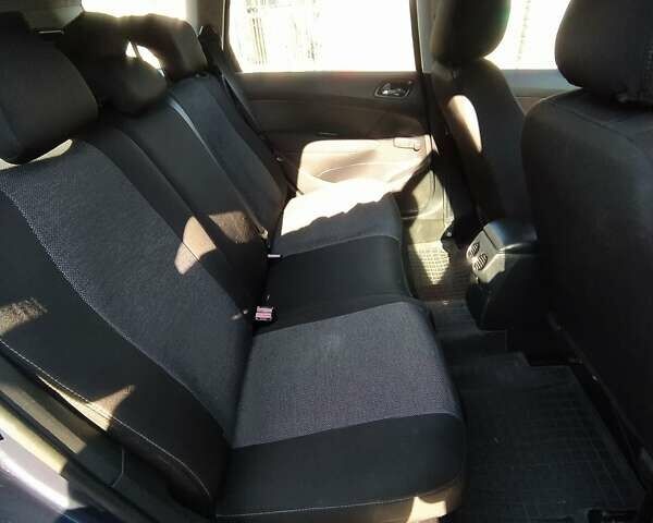 Фиолетовый Пежо 308, объемом двигателя 1.6 л и пробегом 256 тыс. км за 5200 $, фото 18 на Automoto.ua