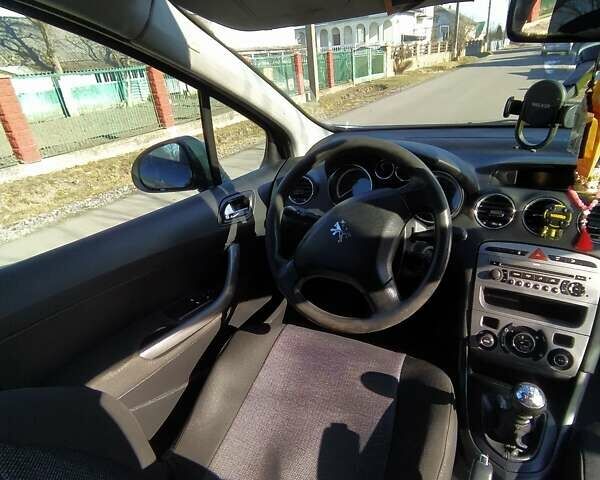 Фиолетовый Пежо 308, объемом двигателя 1.6 л и пробегом 256 тыс. км за 5200 $, фото 13 на Automoto.ua